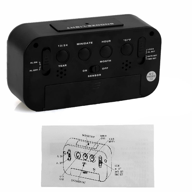Rear controls and instruction sheet for the digital alarm clock