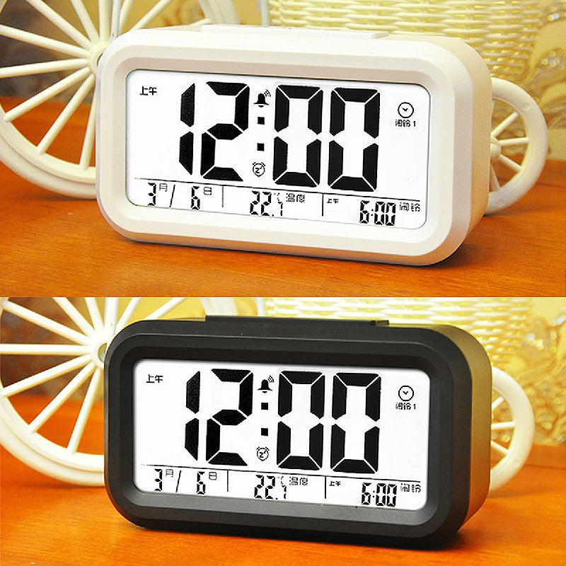 White and black alarm clocks shown for comparison; this listing is for black