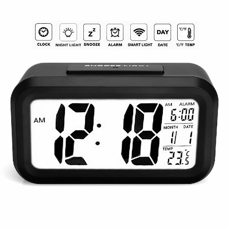 Black digital alarm clock with feature illustrations