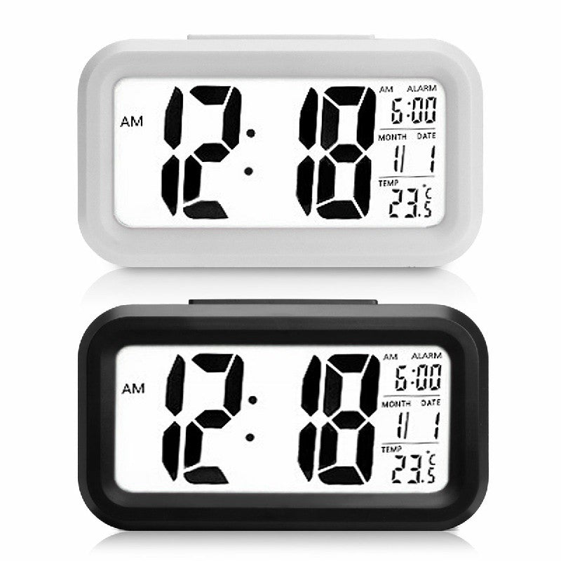 White and black digital alarm clocks; this listing is for black