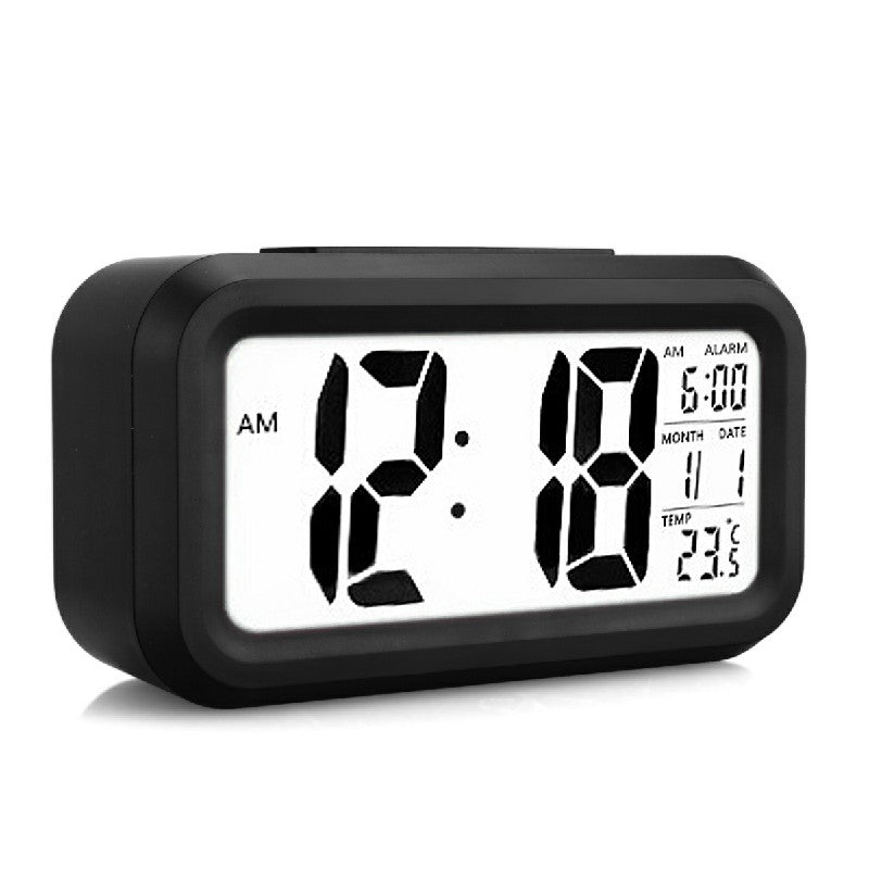 Black digital alarm clock with large time display, date and temperature