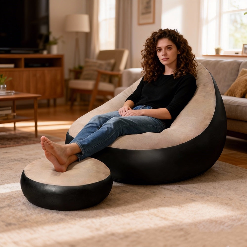 Inflatable lounge chair and foot stool in a living room